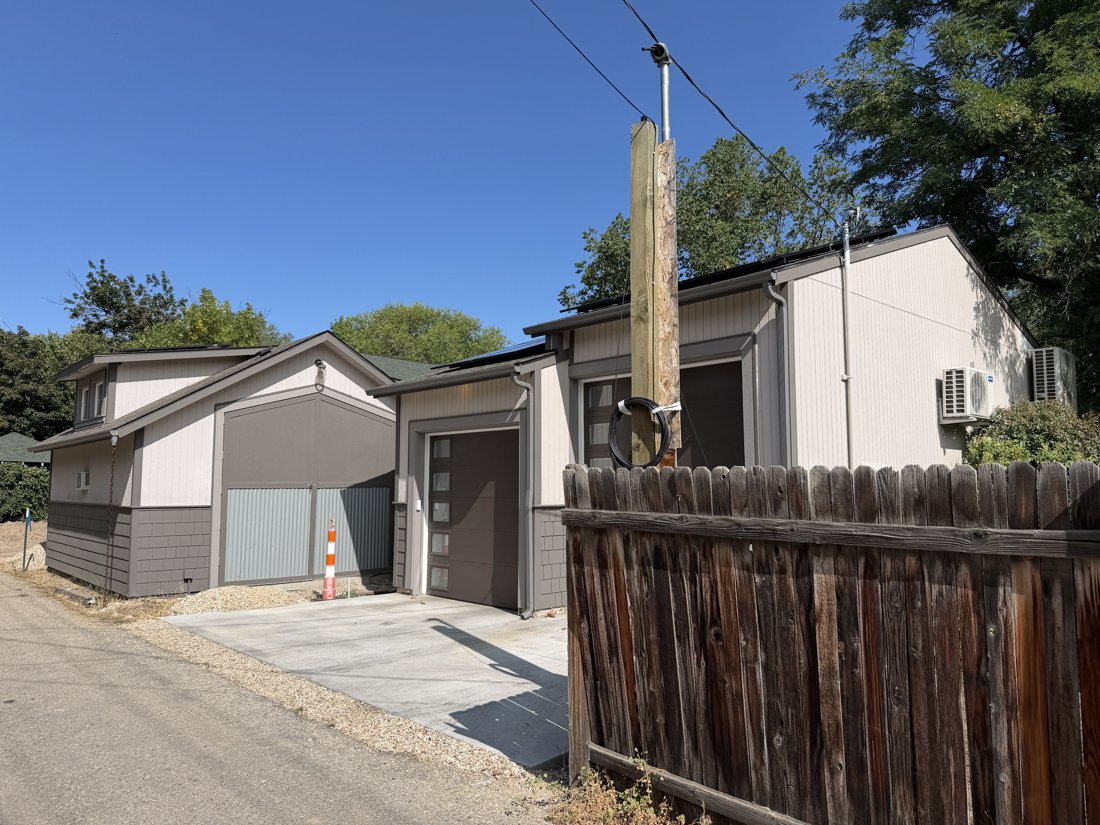 South side, viewed from the south. Detached accessory building and alley relationship.