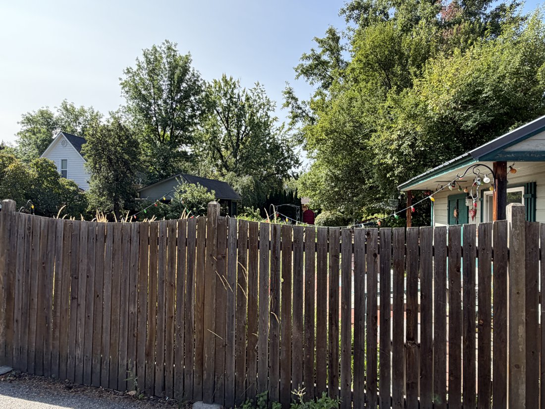 North side, viewed from the northeast. Detached accessory building and alley relationship.