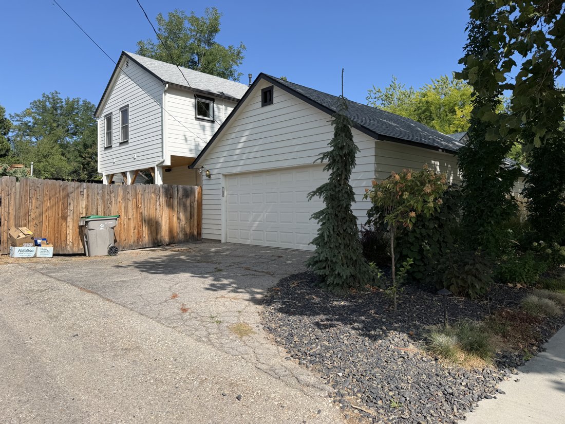 South side, viewed from the south. Detached accessory building and alley relationship.